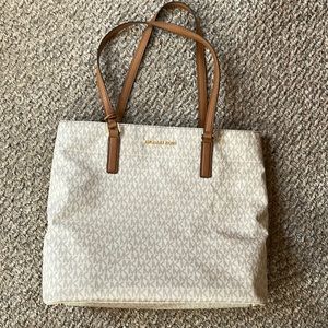 Michael Kors shoulder bag with MK print.  Only used for 1 season.